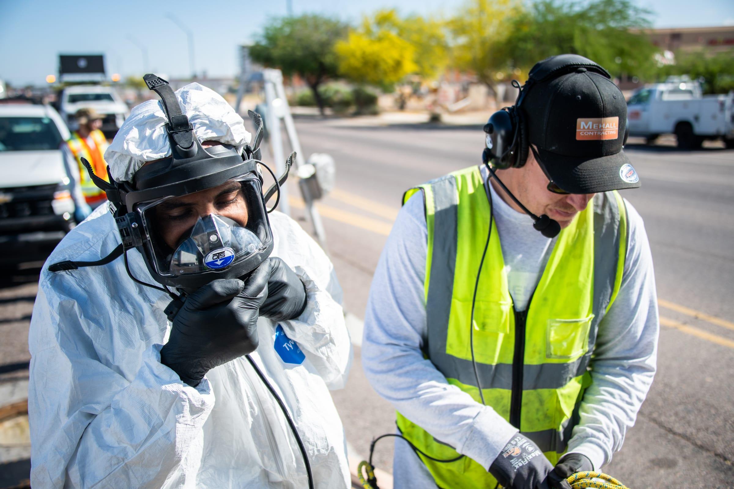 Supplied air technician and comms operator before an entry